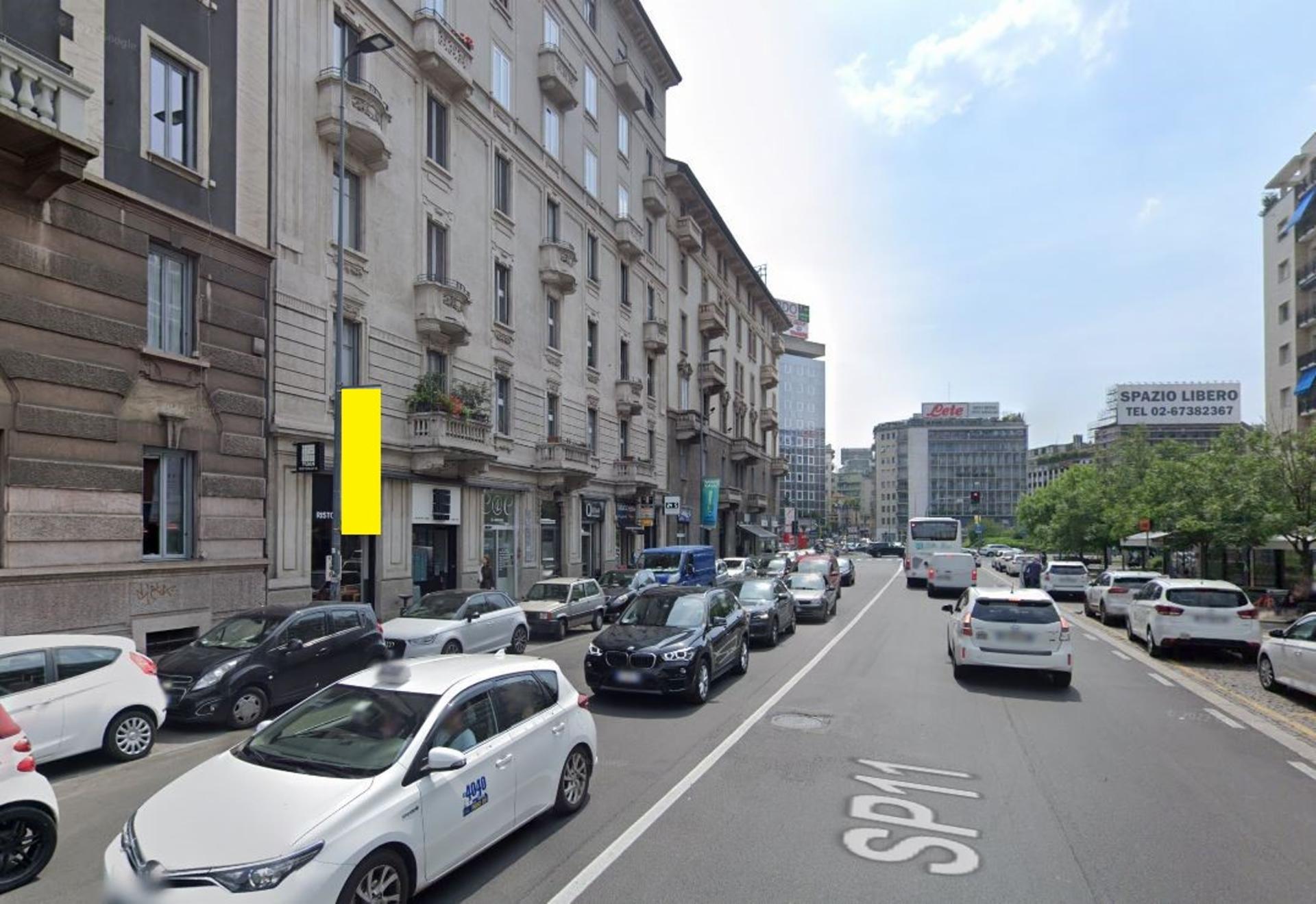 Impianto VERTICAL BANNER a Milano, in zona Quema