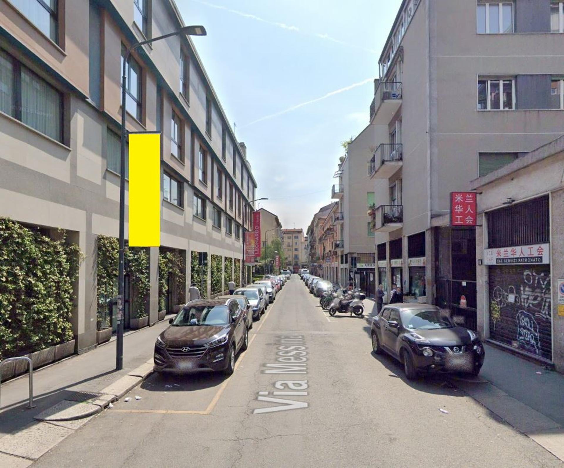 Impianto VERTICAL BANNER a Milano, in zona Eleven
