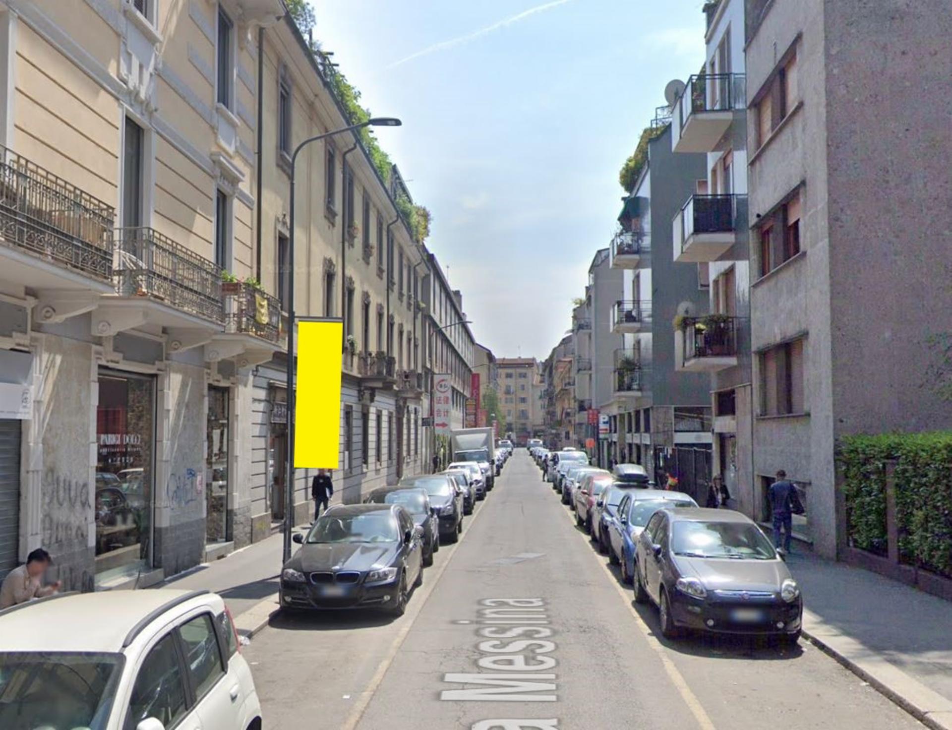 Impianto VERTICAL BANNER a Milano, in zona Parrucchiere