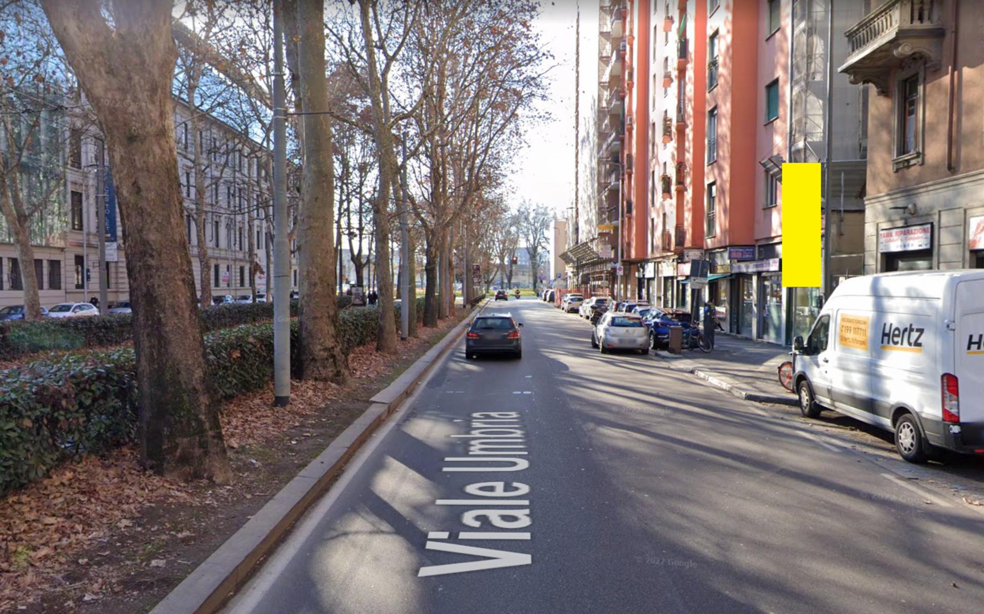 Impianto VERTICAL BANNER a Milano, in zona Ramy & Fady